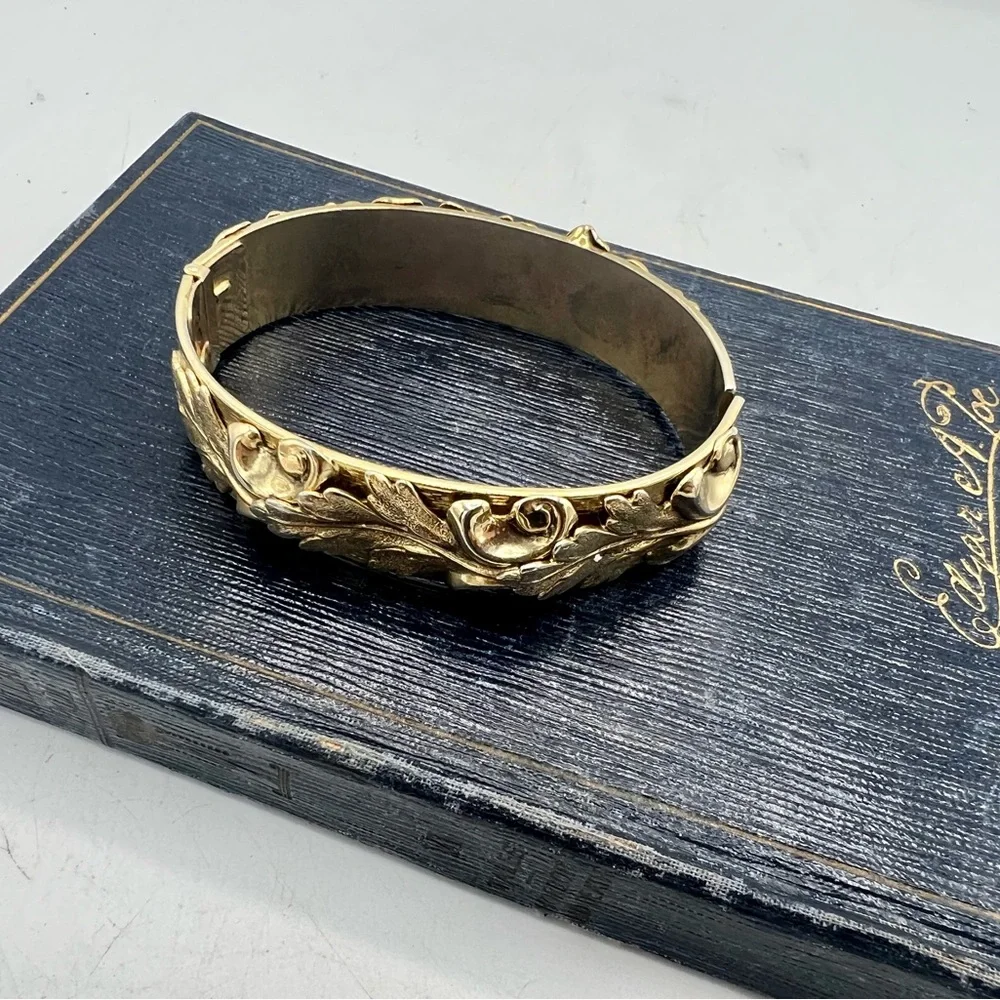 Chunky vintage baroque sculptured gold tone bracelet signed